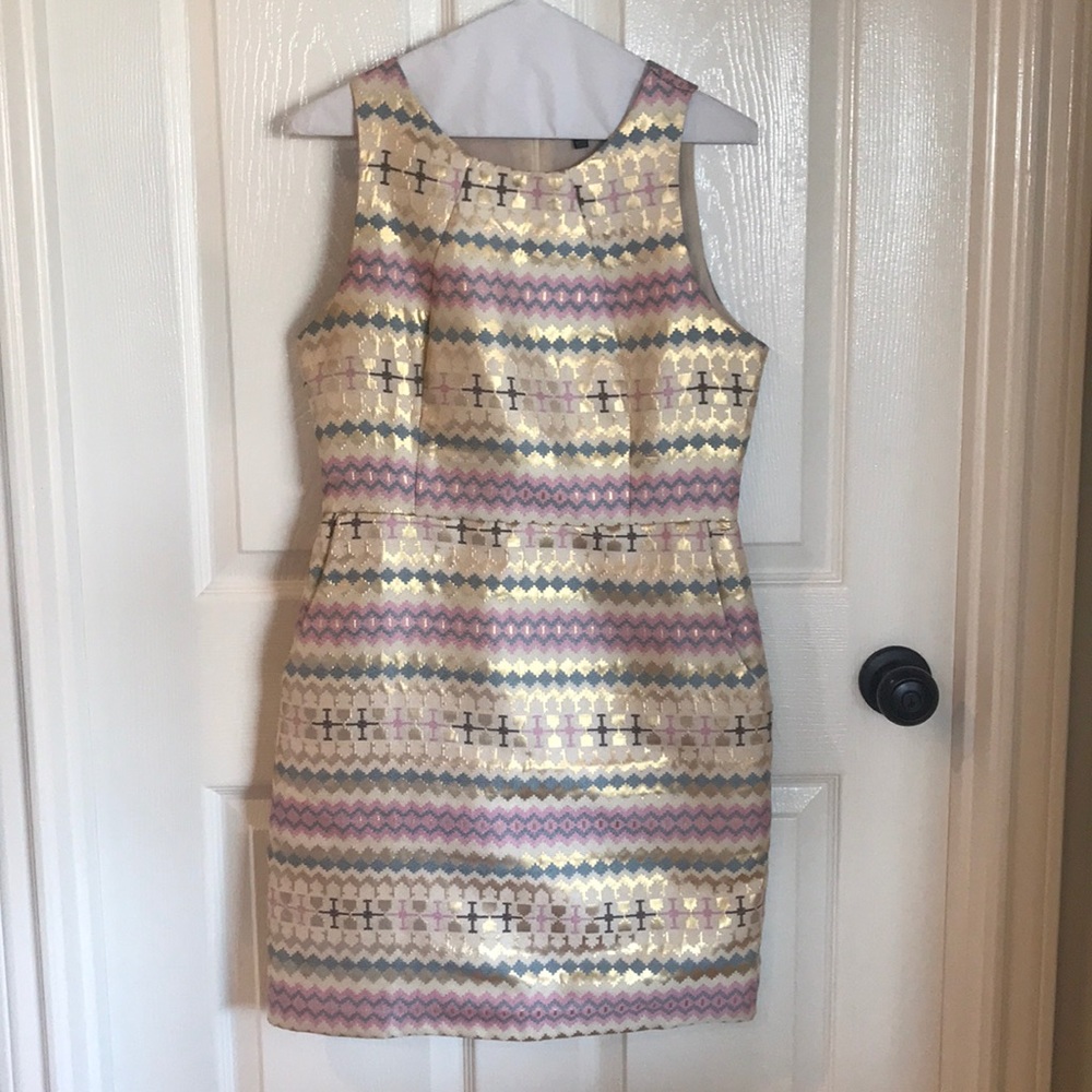 C. Luce gold and pastel dress